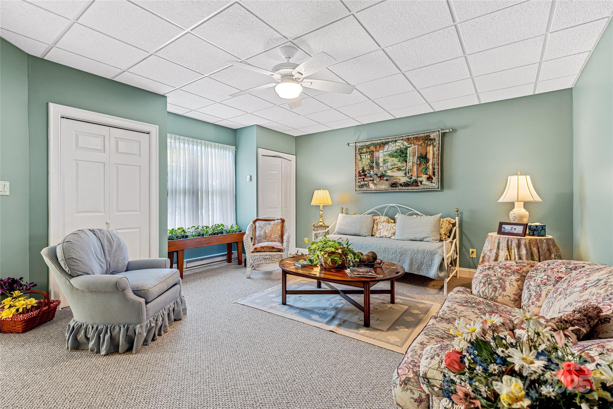 842 Rickel Drive Hendersonville, NC 28739 - Photo 31 of 48 a living room with furniture and a potted plant