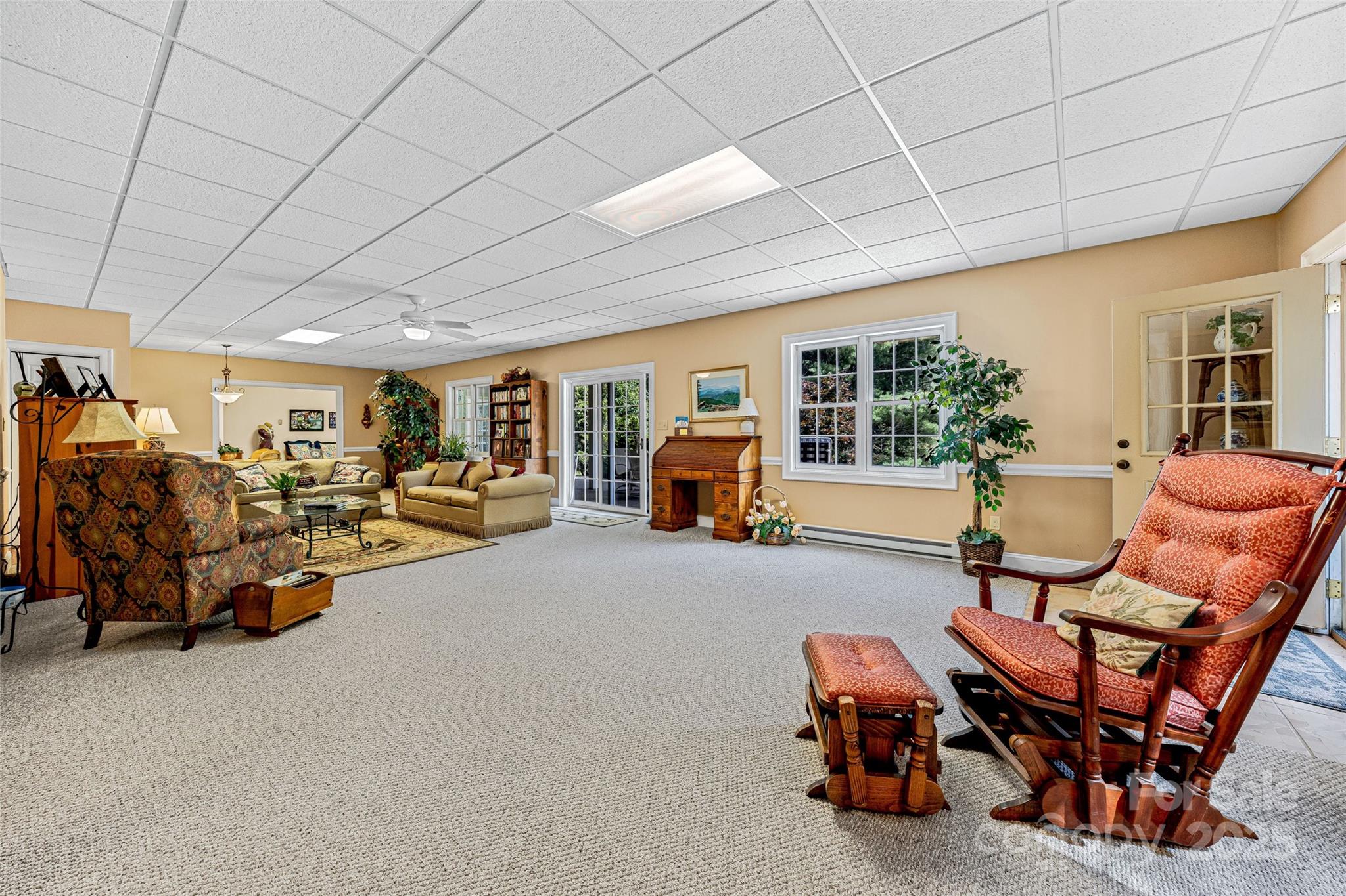 842 Rickel Drive Hendersonville, NC 28739 - Photo 32 of 48 a living room with furniture a table and chairs