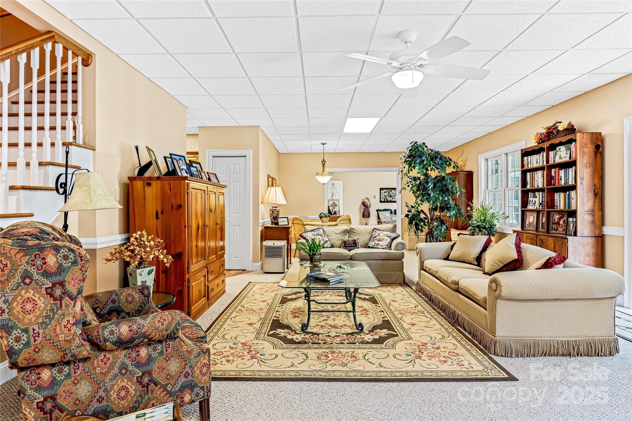 842 Rickel Drive Hendersonville, NC 28739 - Photo 33 of 48 a living room with furniture and a rug