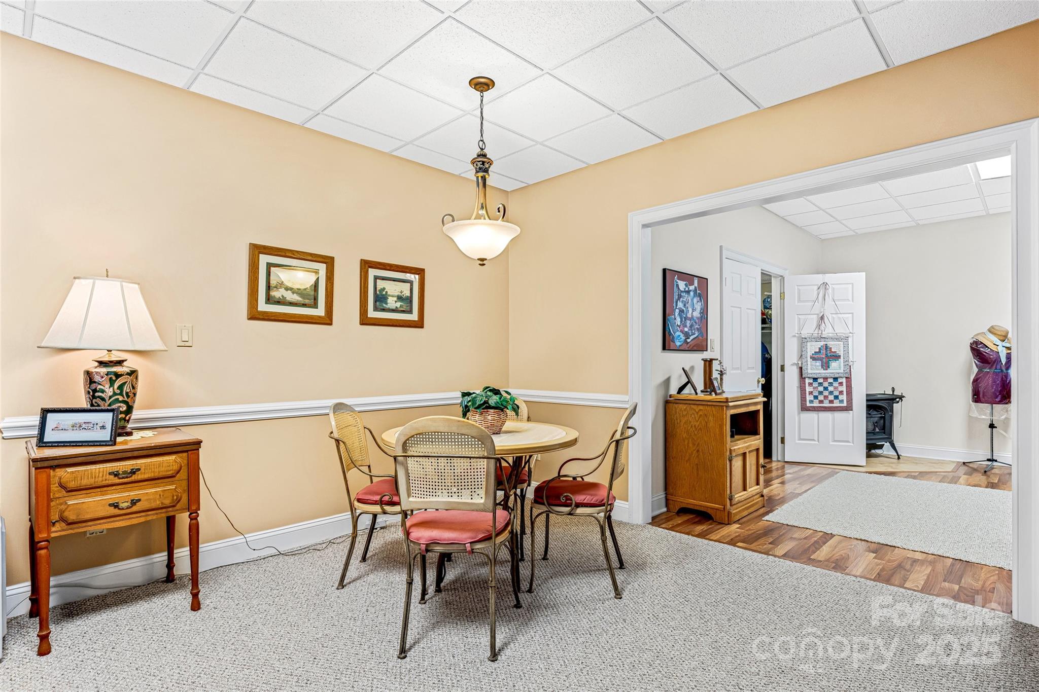 842 Rickel Drive Hendersonville, NC 28739 - Photo 34 of 48 a view of a dining room with furniture and chandelier