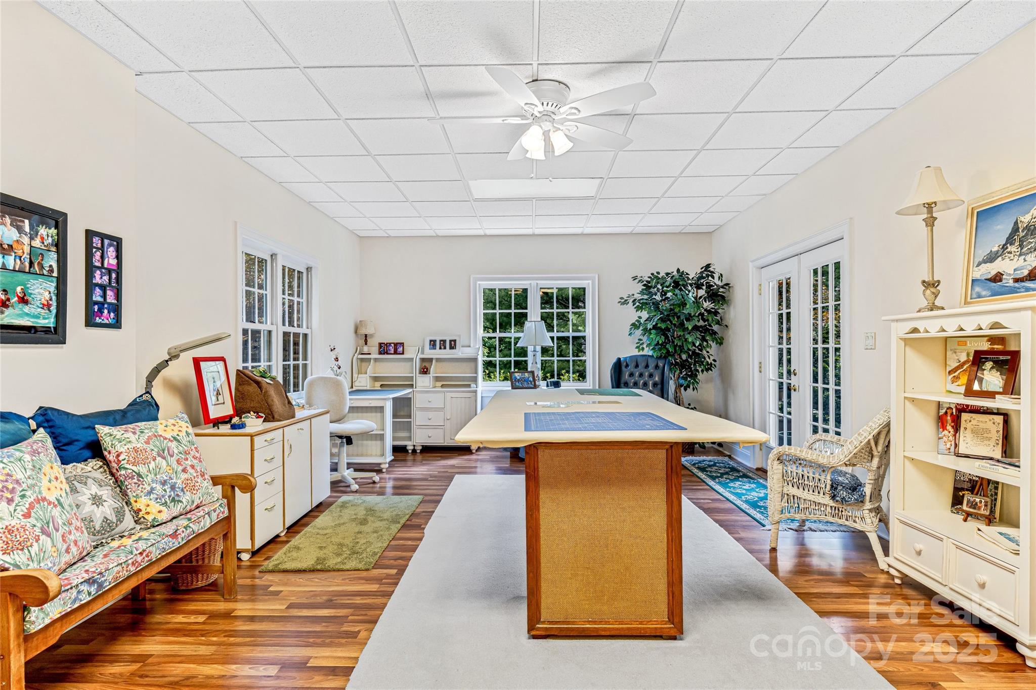842 Rickel Drive Hendersonville, NC 28739 - Photo 35 of 48 a view of a livingroom with furniture window and wooden floor