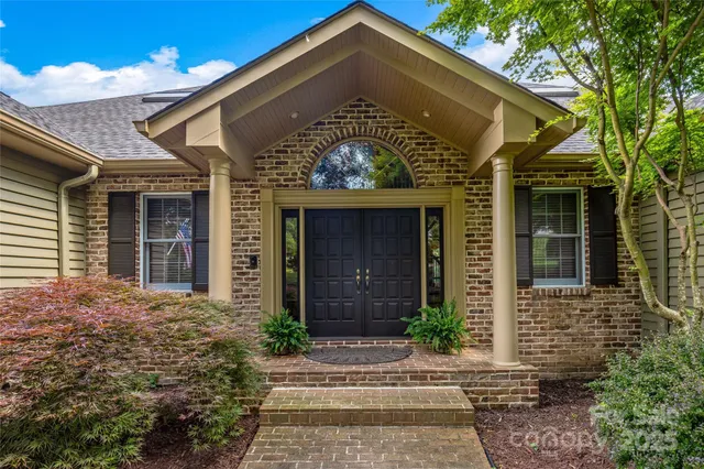 a view of a house with a big yard