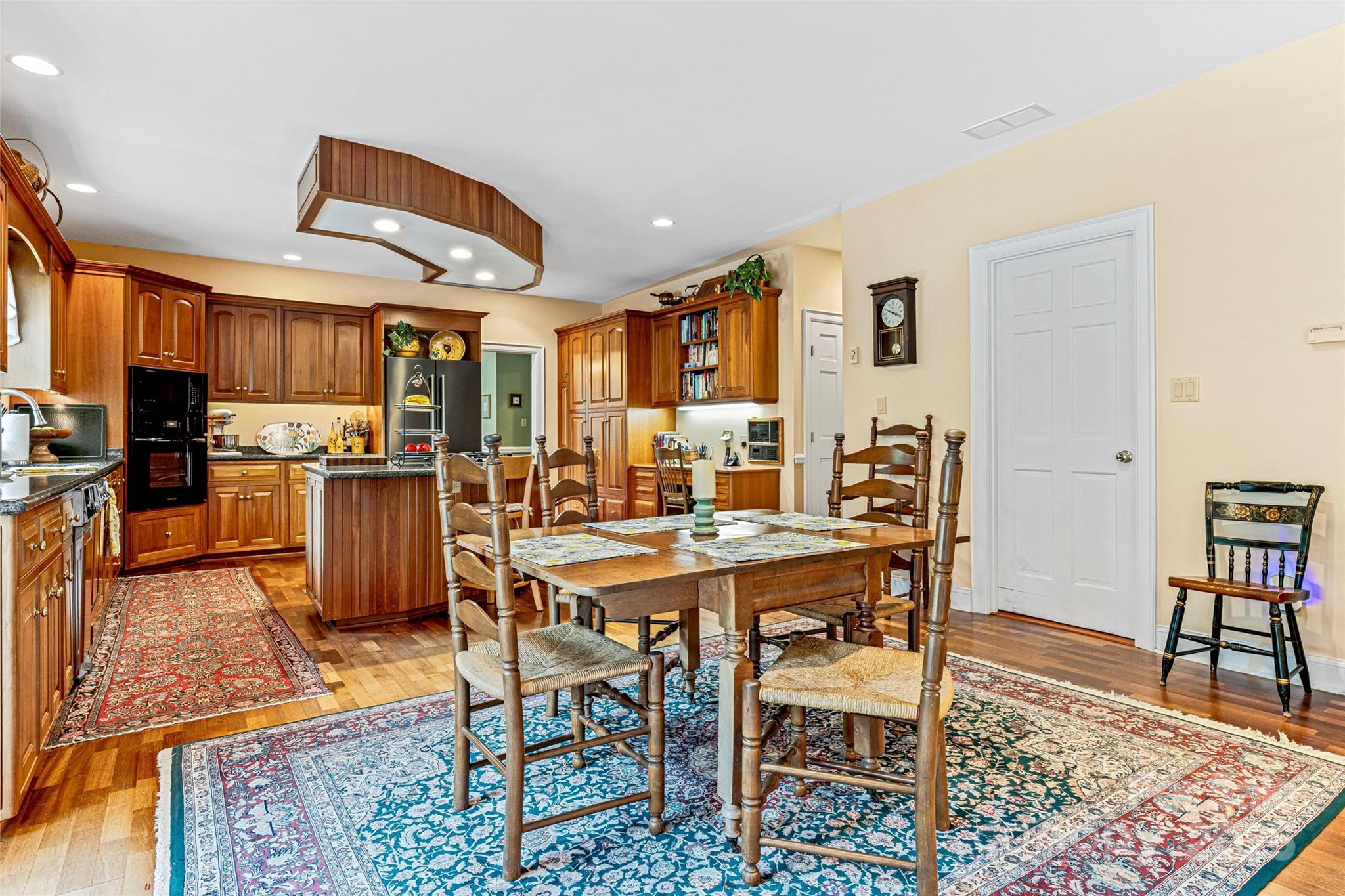 842 Rickel Drive Hendersonville, NC 28739 - Photo 7 of 48 a view of a dining room with furniture