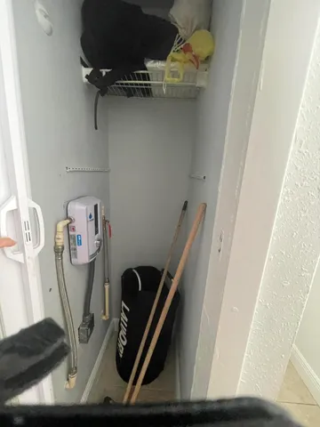 a view of storage and utility room