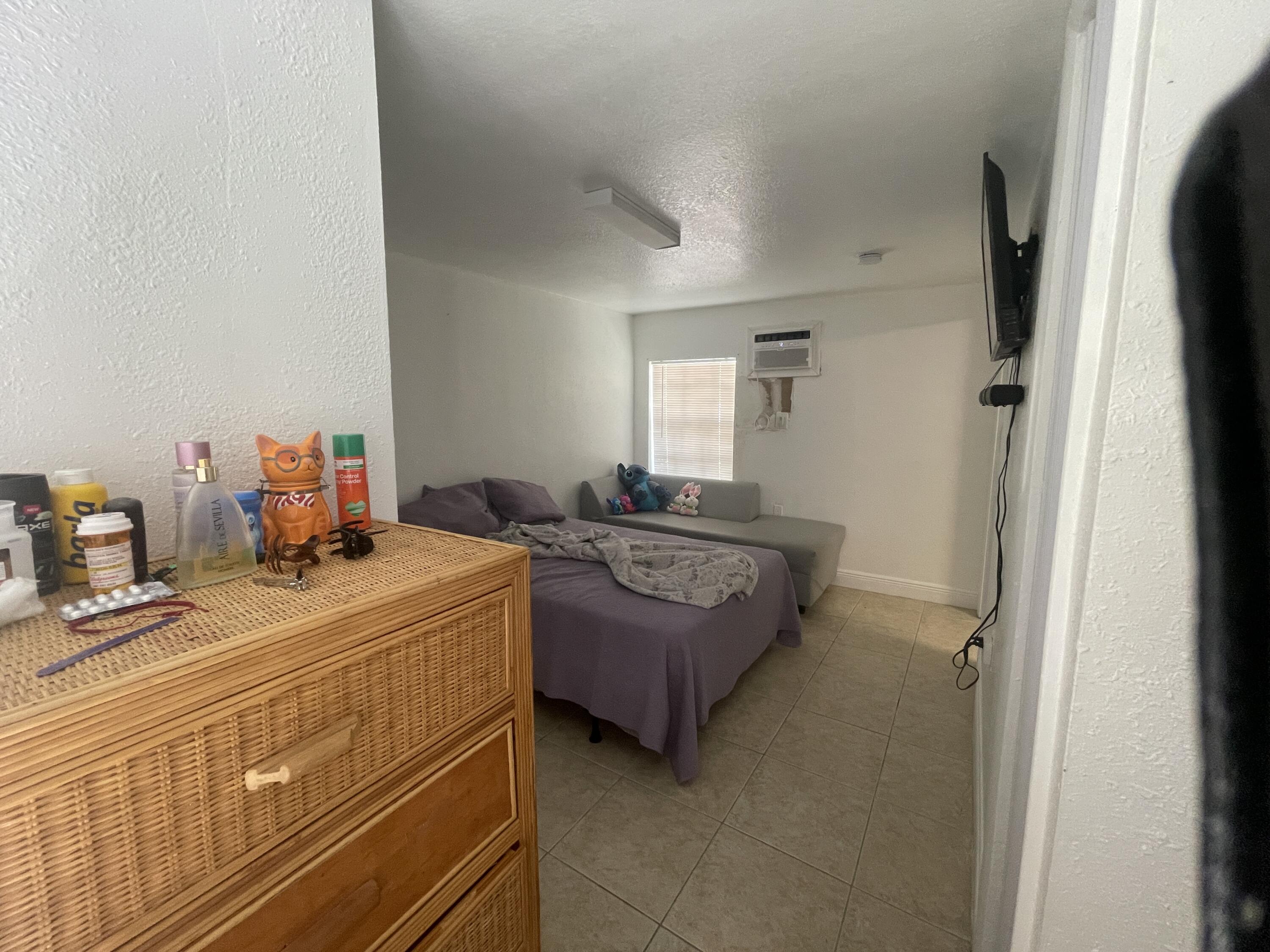 625 73rd Street, Unit AB Marathon, FL 33050 - Photo 10 of 23 a bedroom with a bed and dresser