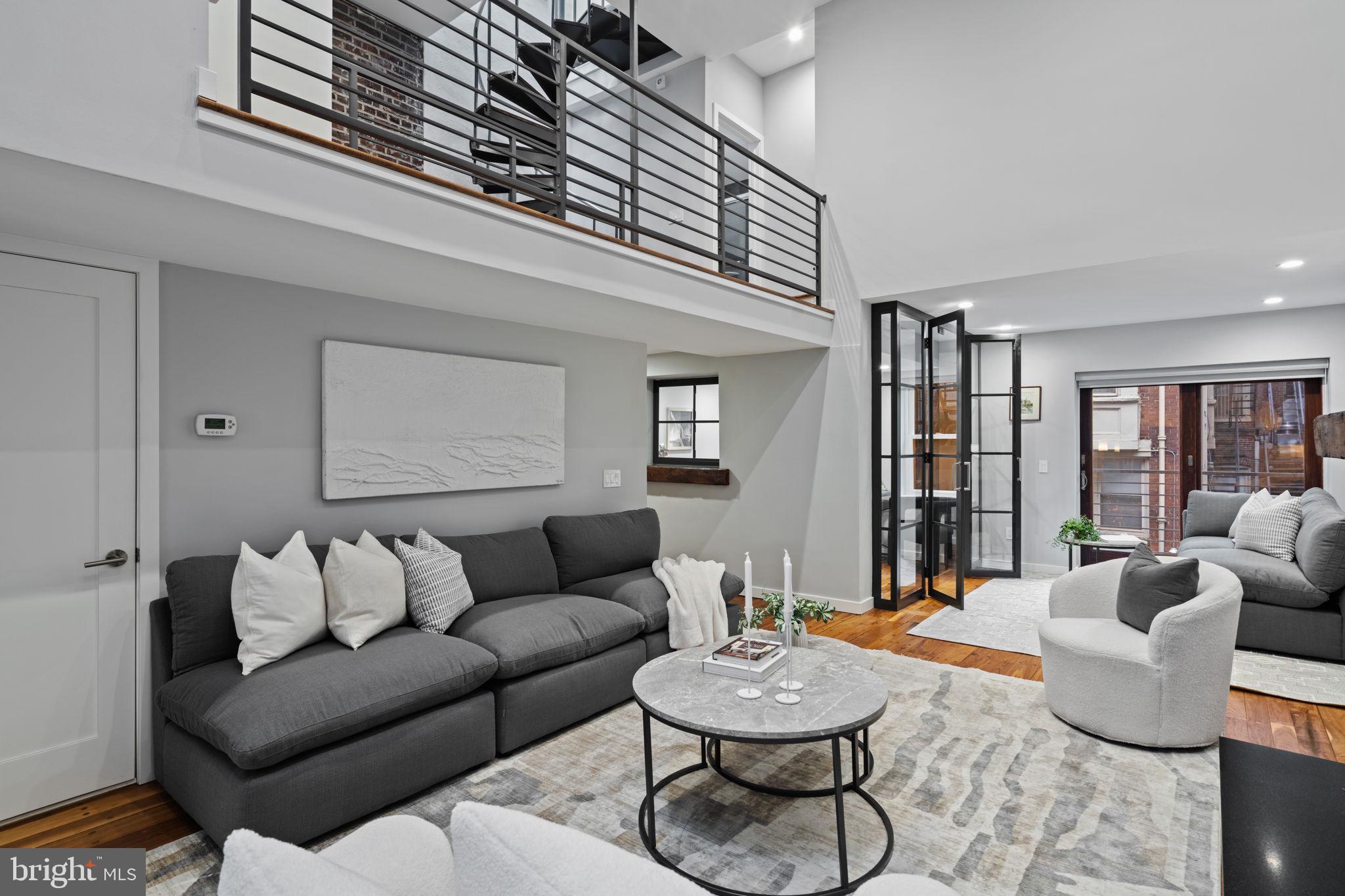2030 Ranstead Street Philadelphia, PA 19103 - Photo 14 of 49 a living room with furniture and wooden floor