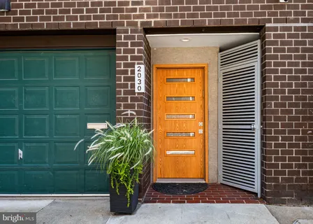 a view of a door and a window