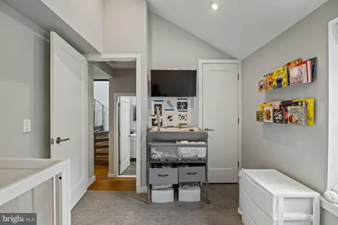a view of cabinets with wooden floor and furniture