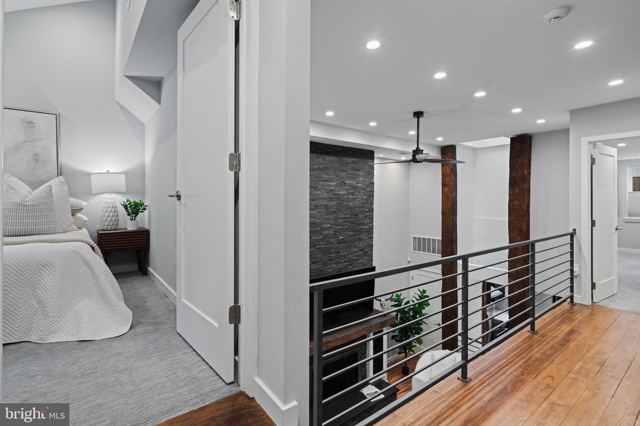 2030 Ranstead Street Philadelphia, PA 19103 - Photo 42 of 49 a view of hallway with wooden floor and stairs