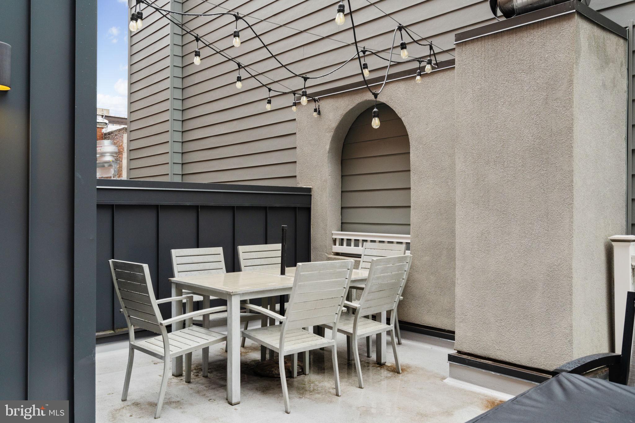 2030 Ranstead Street Philadelphia, PA 19103 - Photo 47 of 49 a dining room with a table and chairs