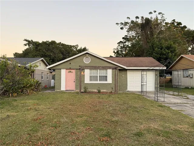 a house with trees in the background