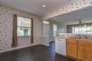 4744 Pond Ridge Drive Riverview, FL 33578 - Photo 15 of 18 a bathroom with a sink and a mirror