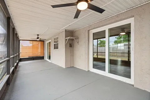 a kitchen with a sink cabinets and window