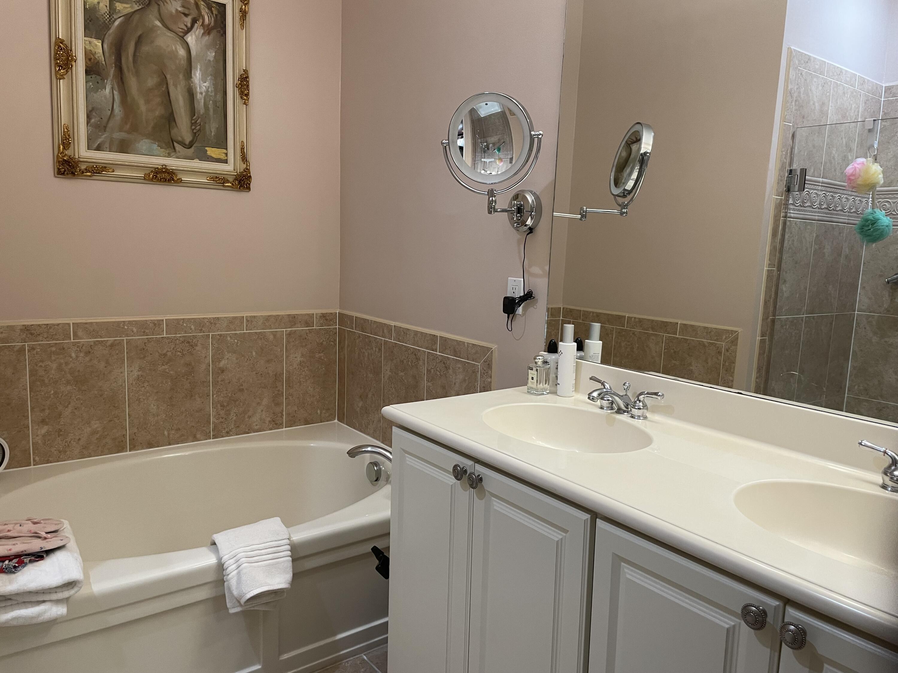 1157 Northwest 18th Avenue Boca Raton, FL 33431 - Photo 17 of 22 a bathroom with a sink and a bathtub