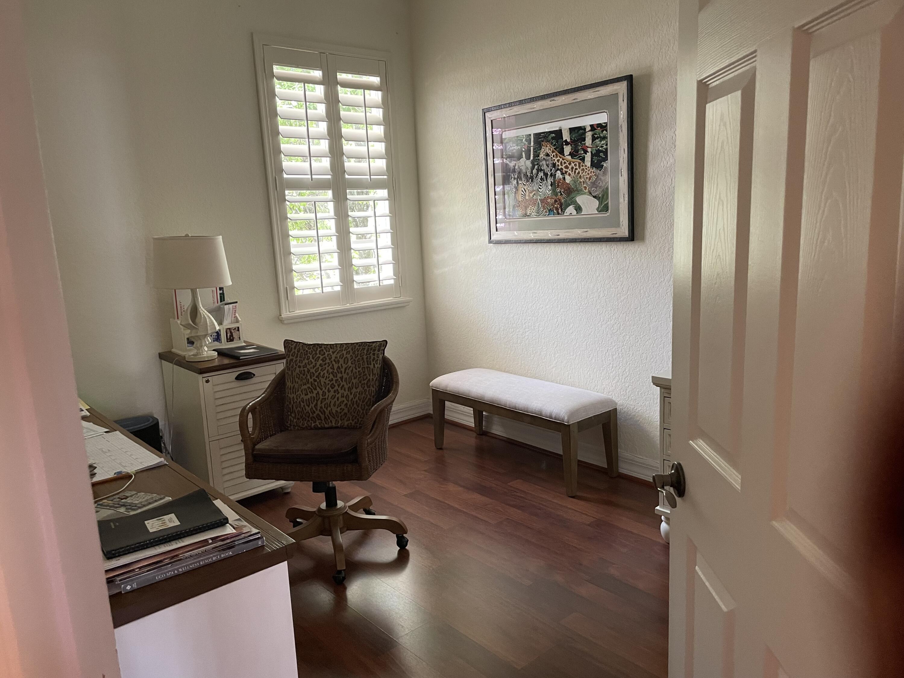 1157 Northwest 18th Avenue Boca Raton, FL 33431 - Photo 21 of 22 a living room with furniture and a window
