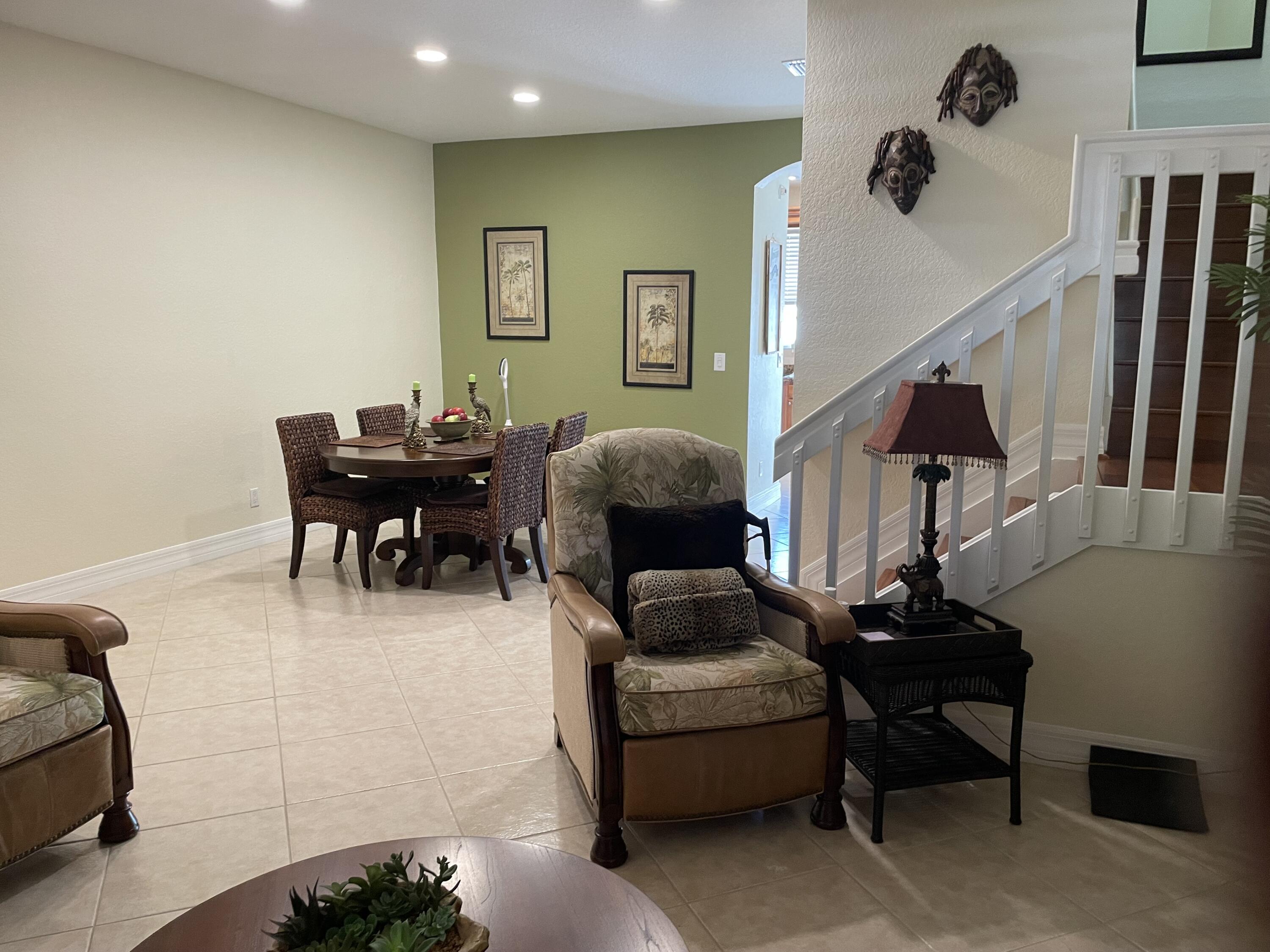 1157 Northwest 18th Avenue Boca Raton, FL 33431 - Photo 8 of 22 a living room with furniture and a piano