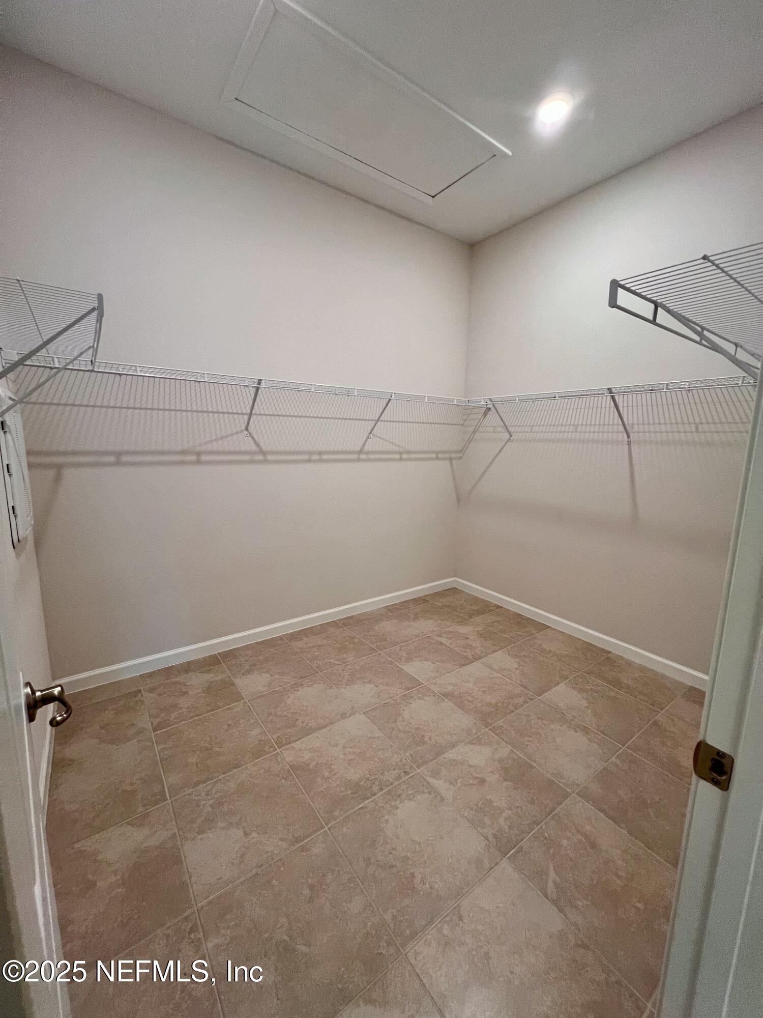 3274 Bailey Ann Drive Ormond Beach, FL 32174 - Photo 35 of 46 a view of a room with racks on the wall
