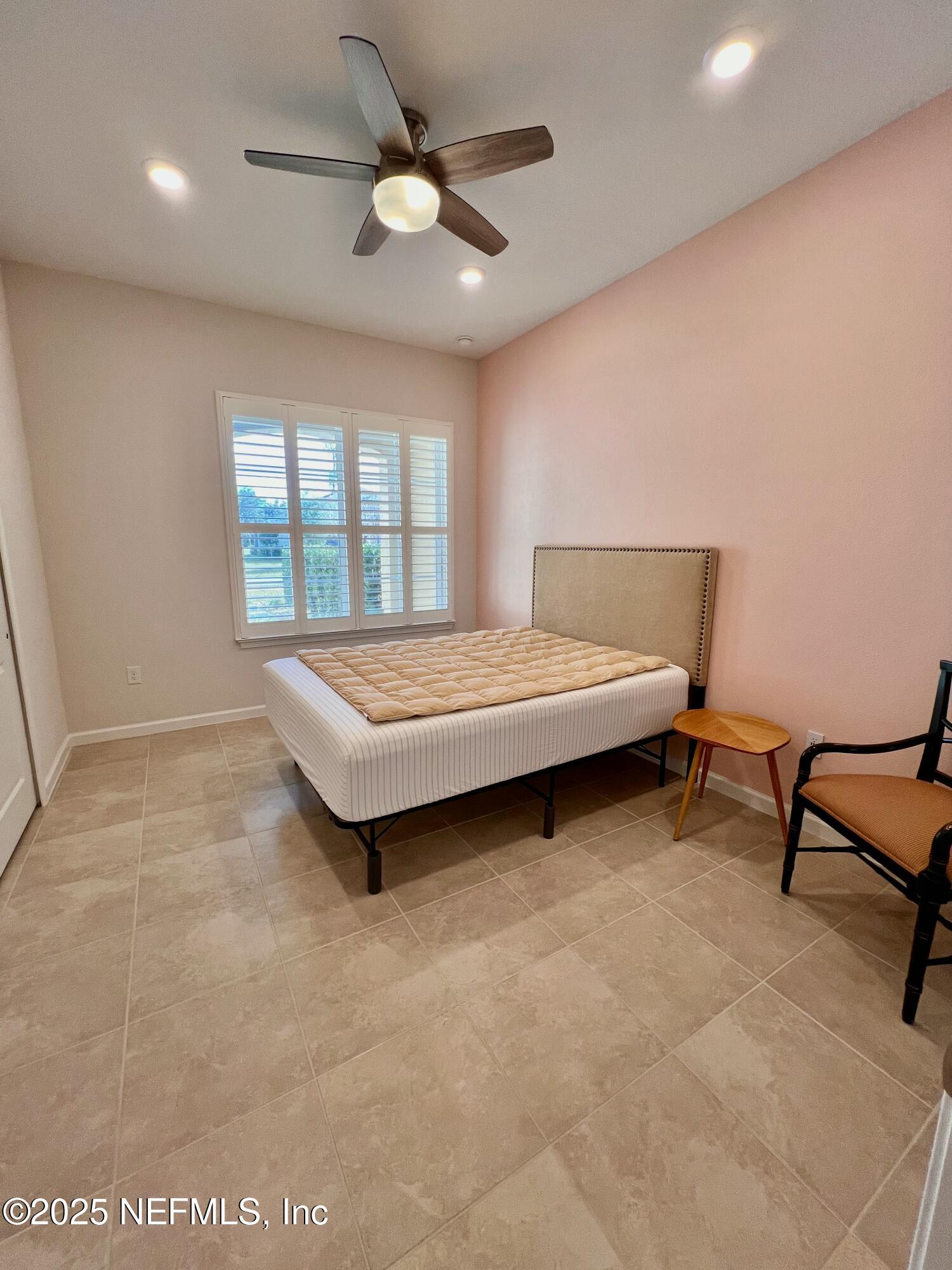 3274 Bailey Ann Drive Ormond Beach, FL 32174 - Photo 36 of 46 a bedroom with a bed and a window