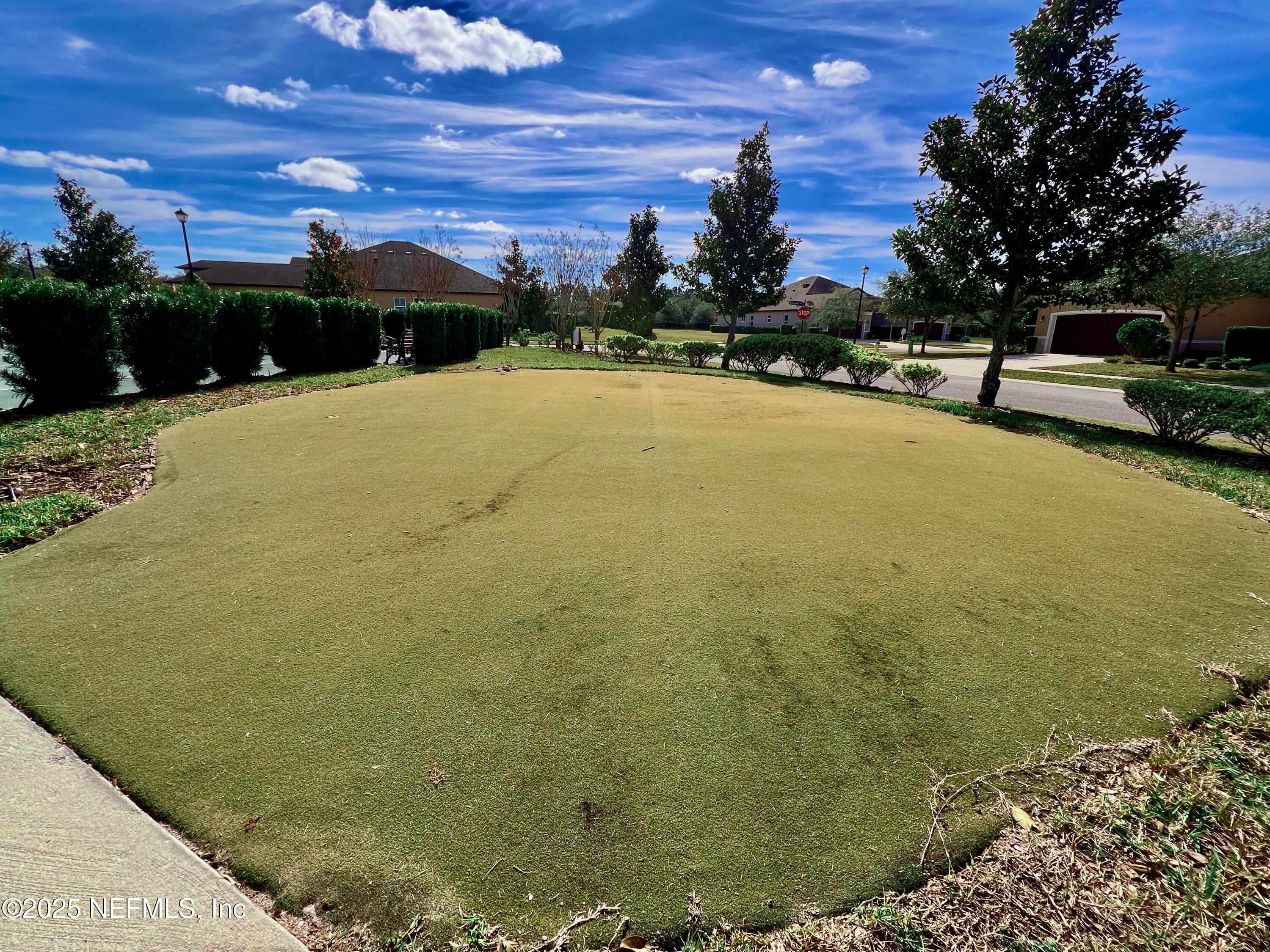 3274 Bailey Ann Drive Ormond Beach, FL 32174 - Photo 44 of 46 a view of swimming pool with outdoor seating and yard in back