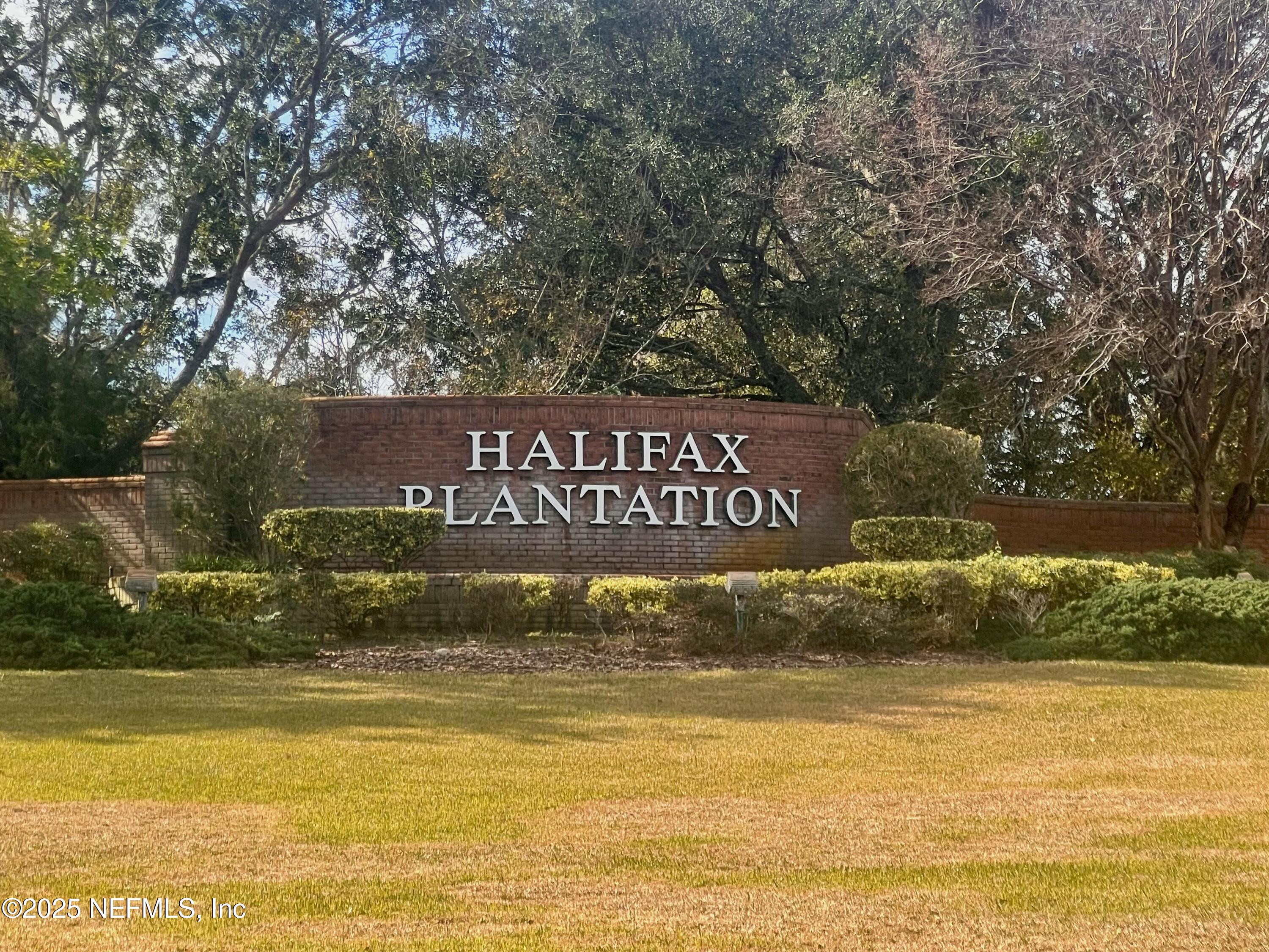 3274 Bailey Ann Drive Ormond Beach, FL 32174 - Photo 45 of 46 a view of swimming pool with an outdoor space and seating area