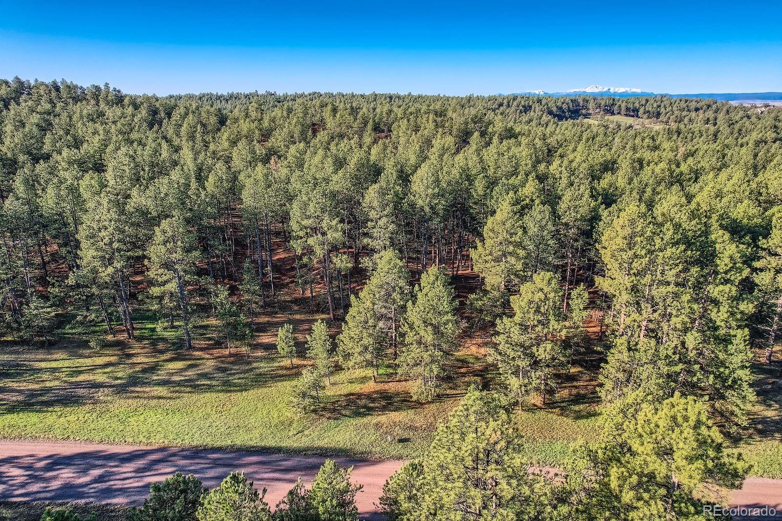 856 Woodridge Road Franktown, CO 80116 - Photo 11 of 28 a view of beach and ocean