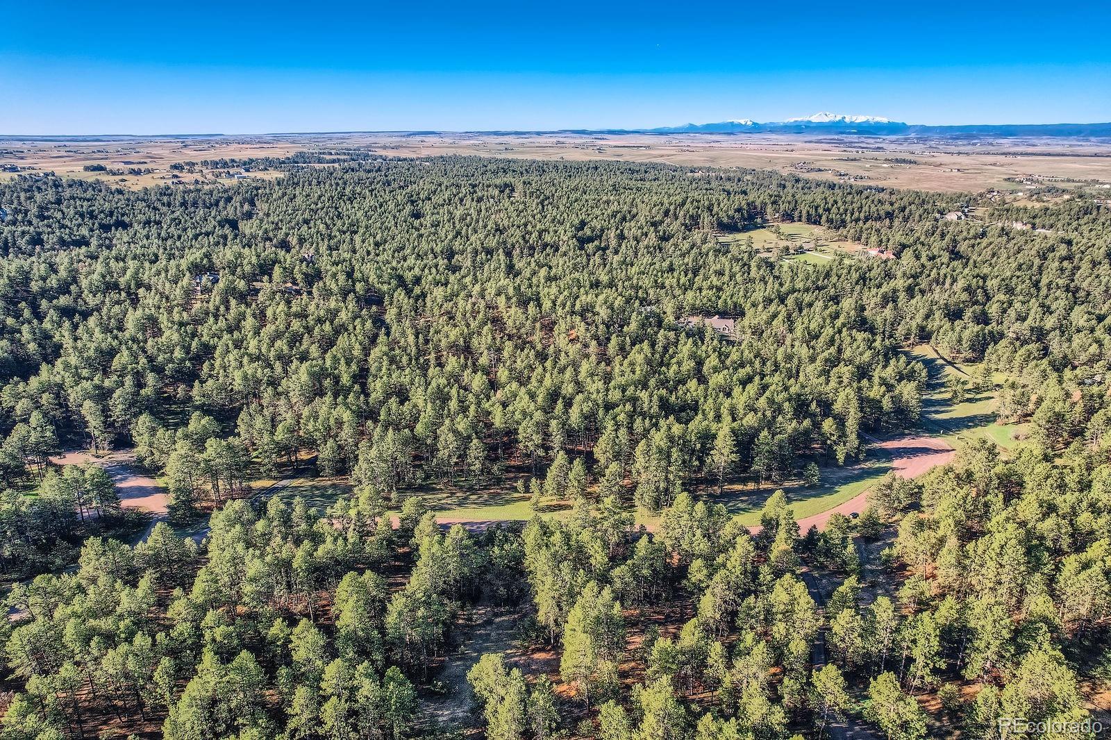 856 Woodridge Road Franktown, CO 80116 - Photo 16 of 28 view of city and mountain
