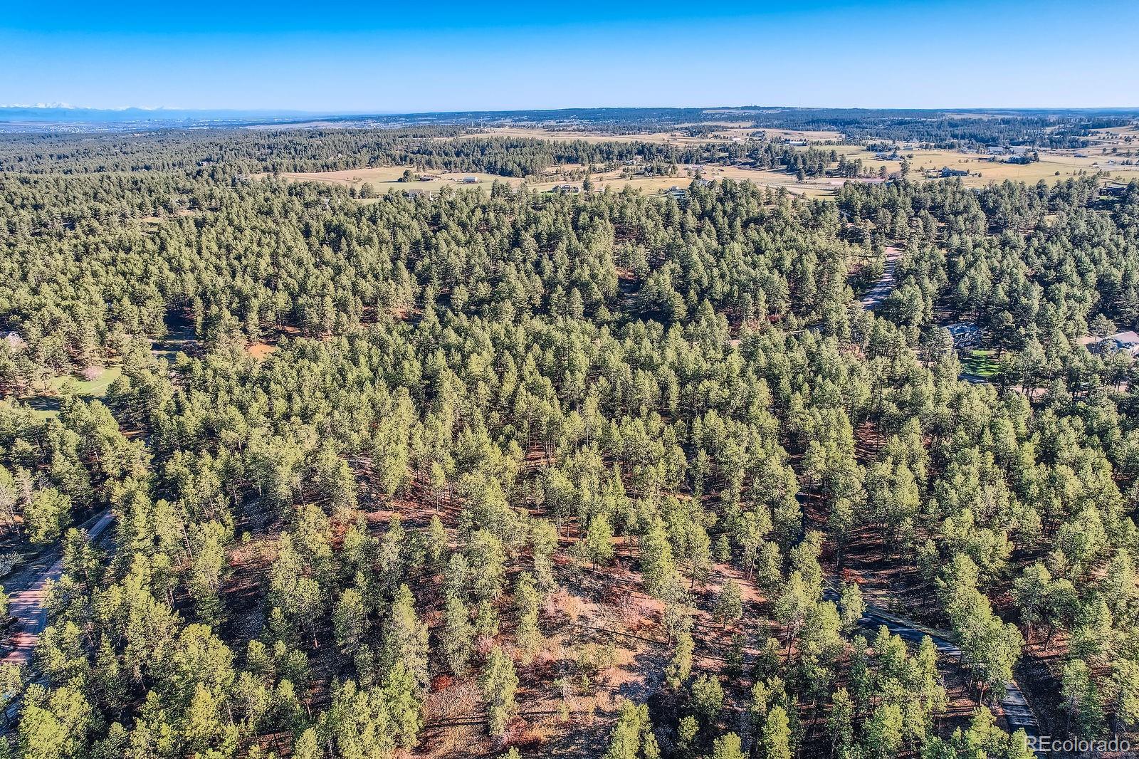 856 Woodridge Road Franktown, CO 80116 - Photo 21 of 28 a view of an ocean