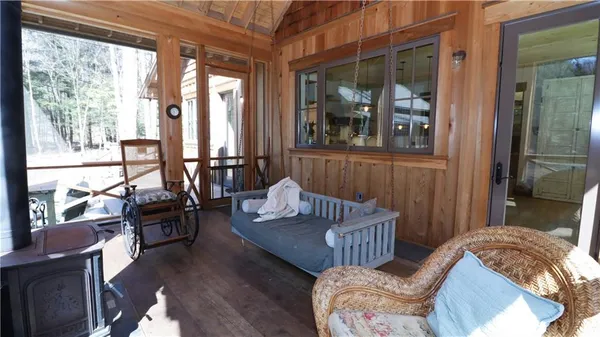 a living room with furniture and windows