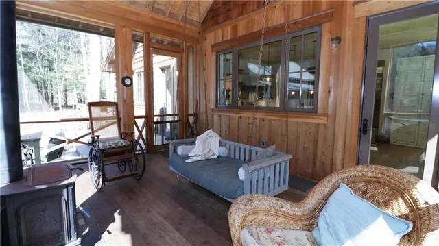 a living room with furniture and windows