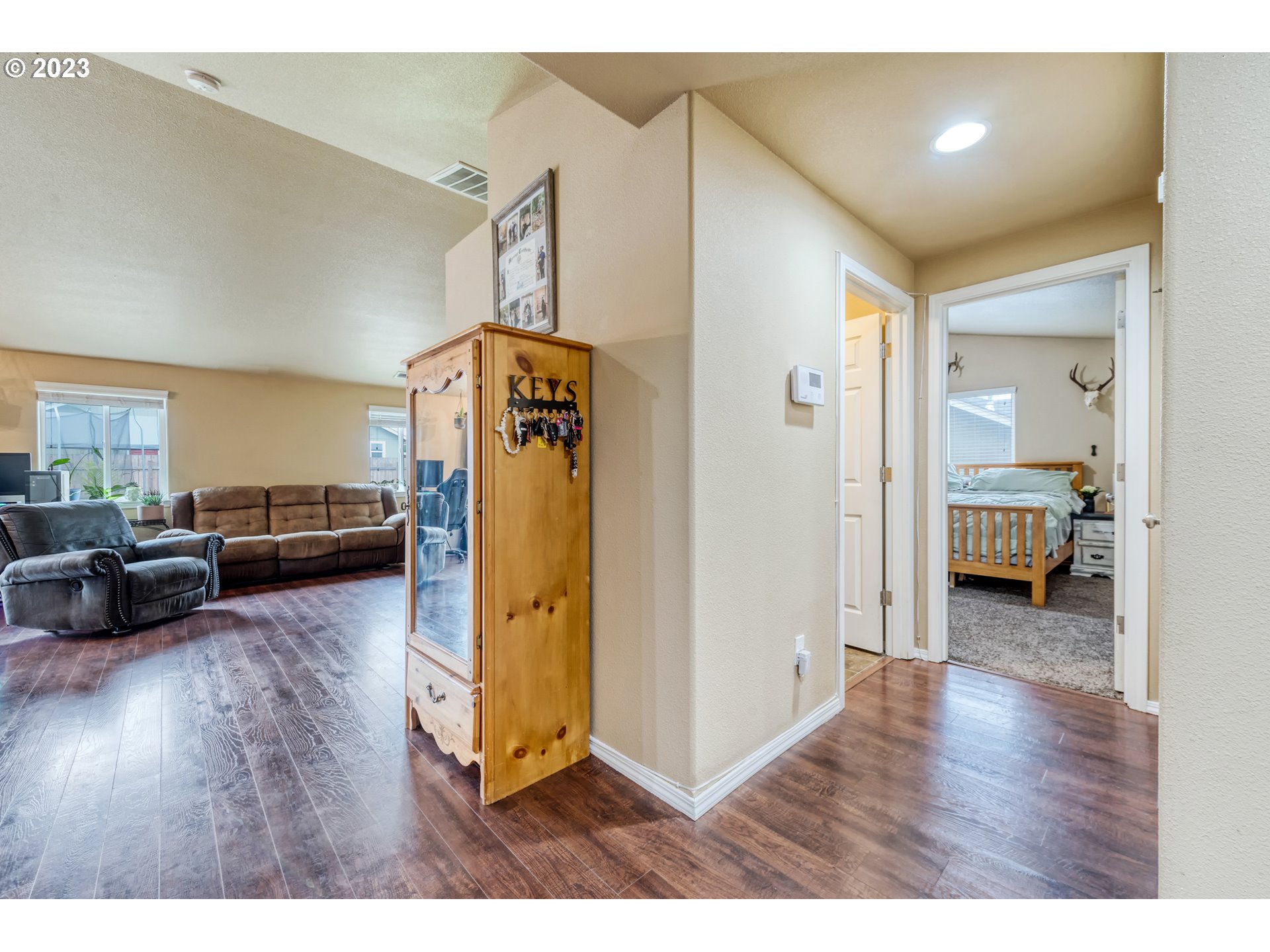 237 Rowan Street Roseburg, OR 97471 - Photo 15 of 35 a living room with furniture and a wooden floor