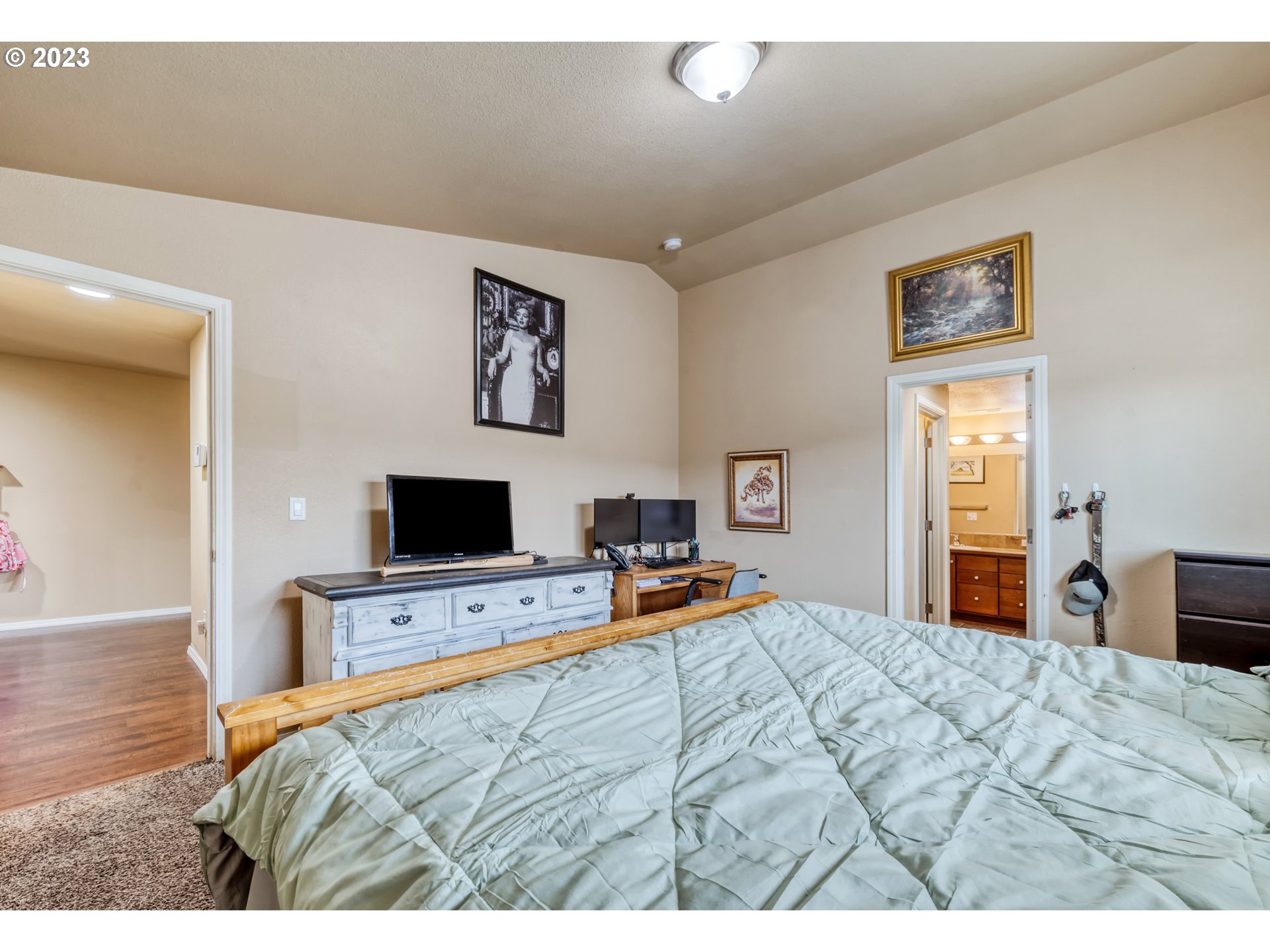237 Rowan Street Roseburg, OR 97471 - Photo 18 of 35 a bedroom with a bed and a flat screen tv