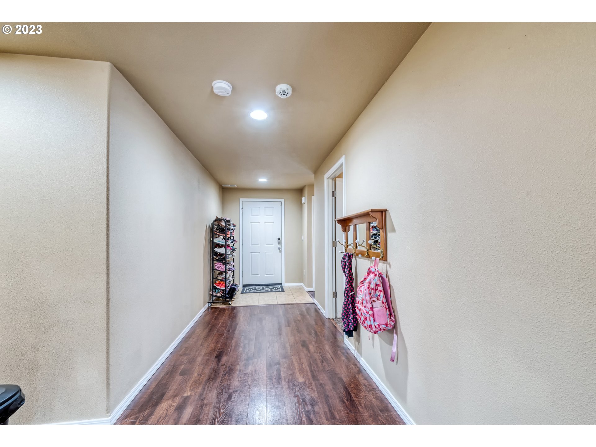 237 Rowan Street Roseburg, OR 97471 - Photo 22 of 35 a view of a hallway with wooden floor