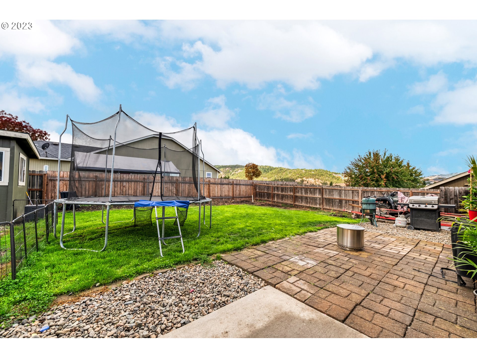 237 Rowan Street Roseburg, OR 97471 - Photo 26 of 35 a view of a garden with a slide