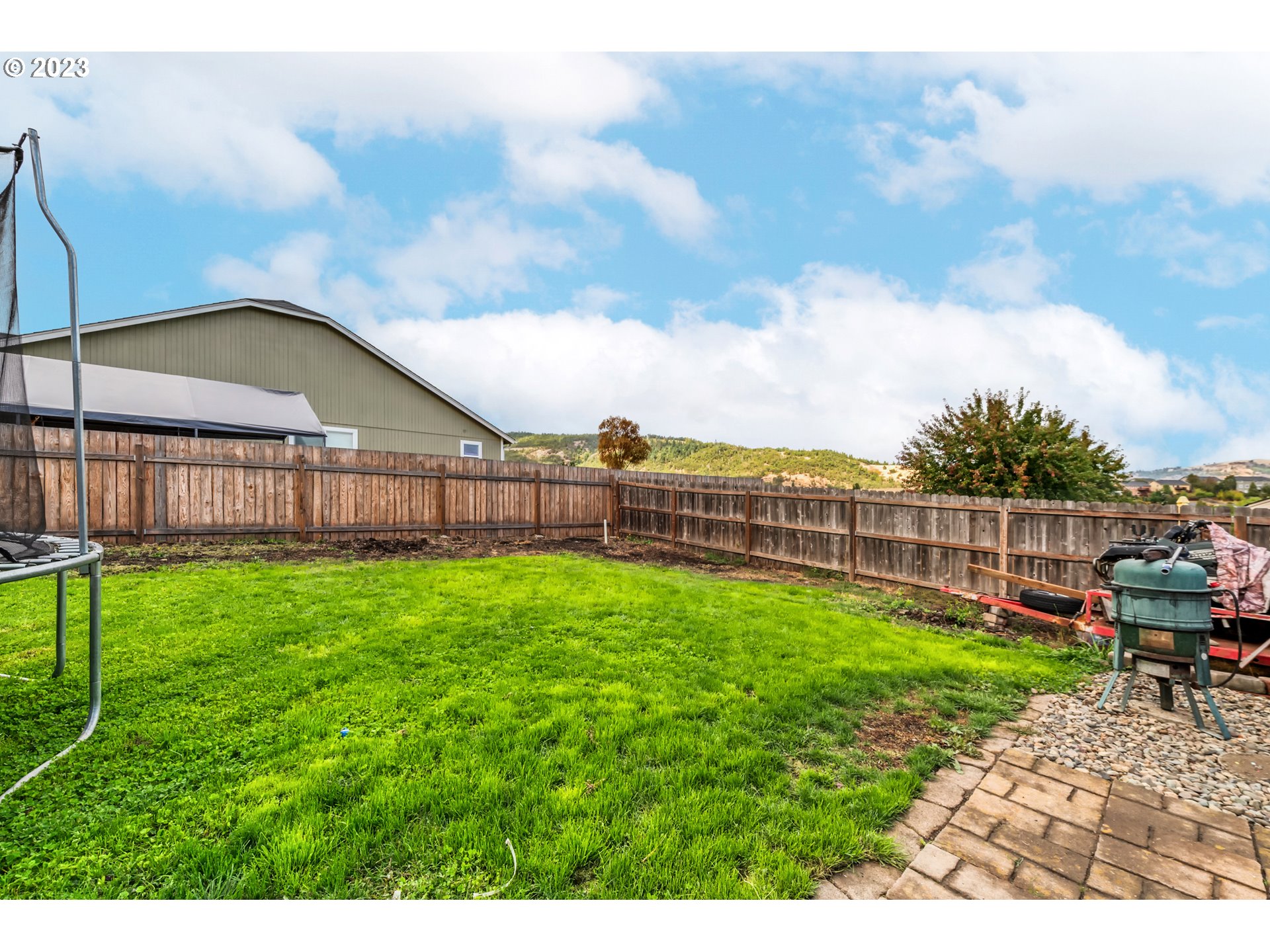 237 Rowan Street Roseburg, OR 97471 - Photo 27 of 35 a view of a garden with a slide