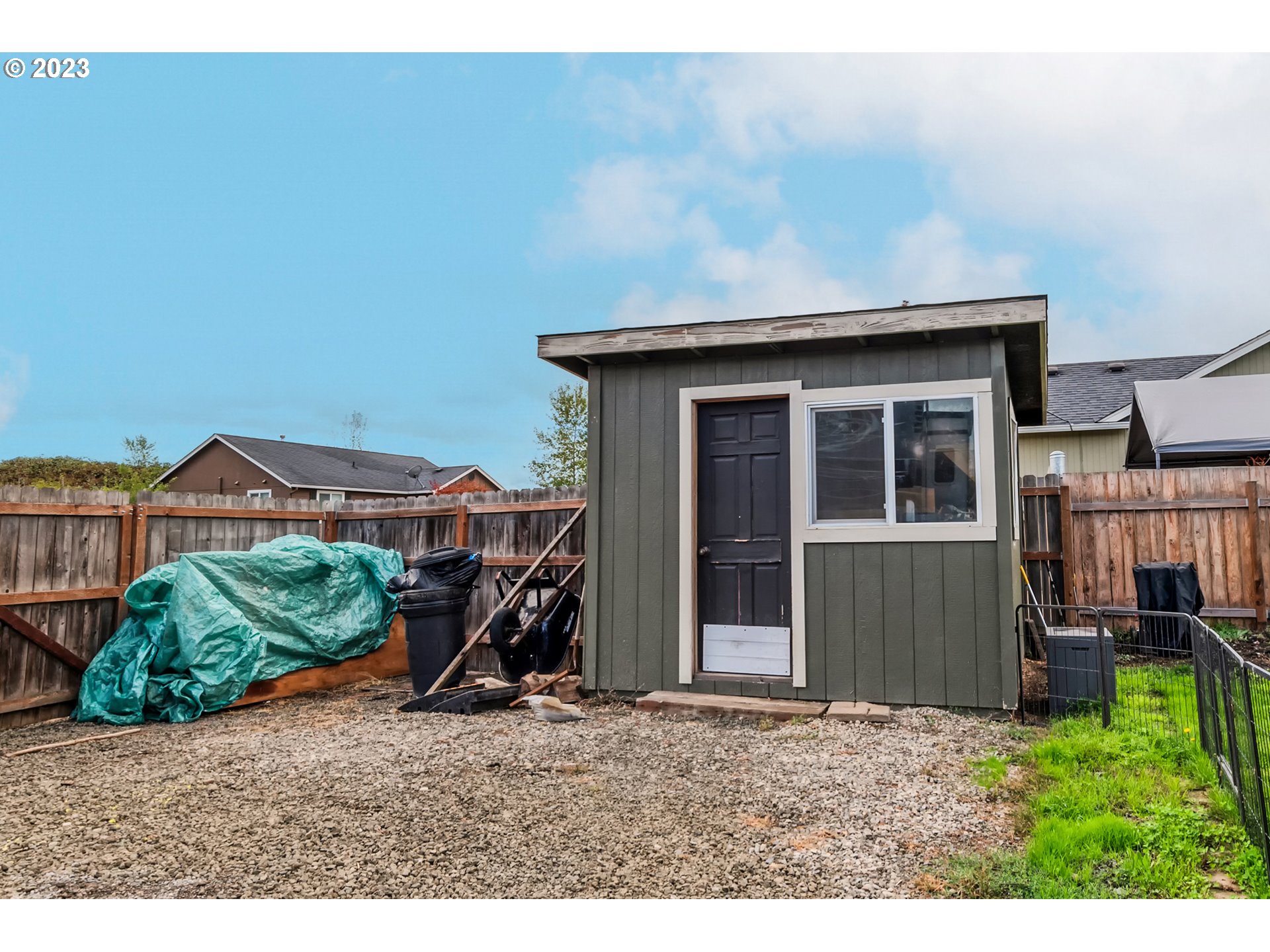 237 Rowan Street Roseburg, OR 97471 - Photo 28 of 35 a backyard of a house with barbeque oven