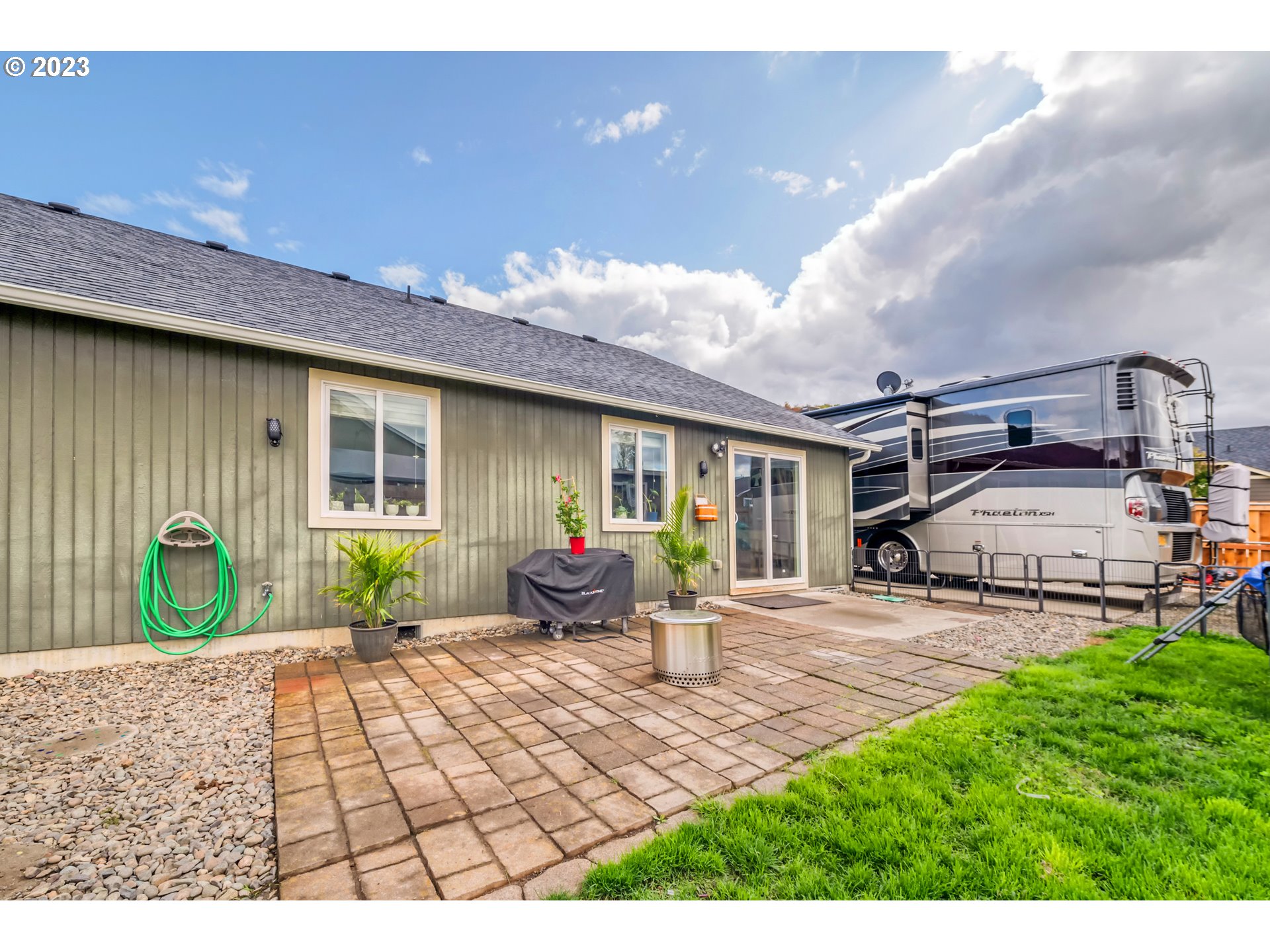 237 Rowan Street Roseburg, OR 97471 - Photo 30 of 35 a house view with a sitting space and garden space