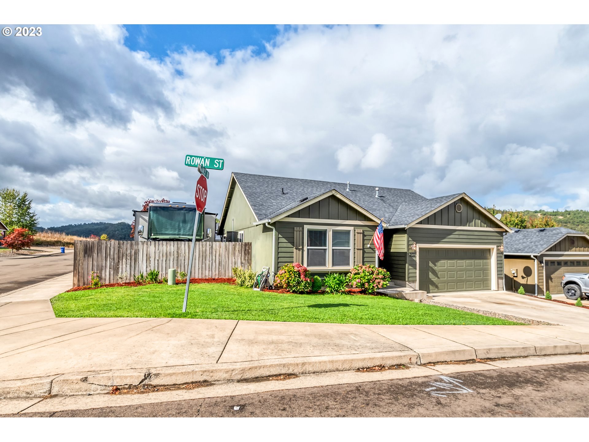 237 Rowan Street Roseburg, OR 97471 - Photo 3 of 35 a view of a house with a garden and pathway