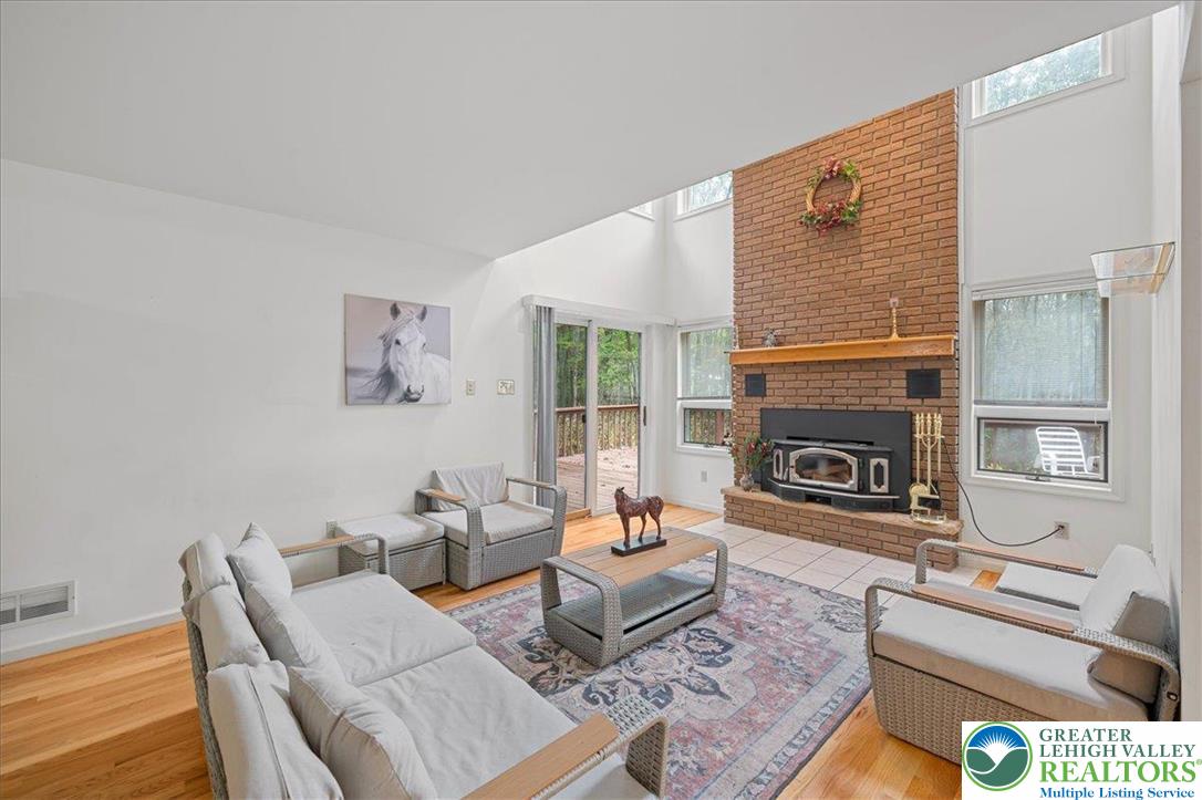 131 Stone Ridge Albrightsville, PA 18210 - Photo 11 of 51 a living room with furniture and a fireplace