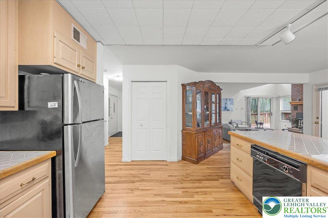 131 Stone Ridge Albrightsville, PA 18210 - Photo 17 of 51 a kitchen with stainless steel appliances granite countertop a refrigerator and a stove top oven