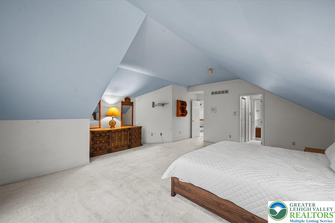 131 Stone Ridge Albrightsville, PA 18210 - Photo 19 of 51 a spacious bedroom with a bed and a dresser