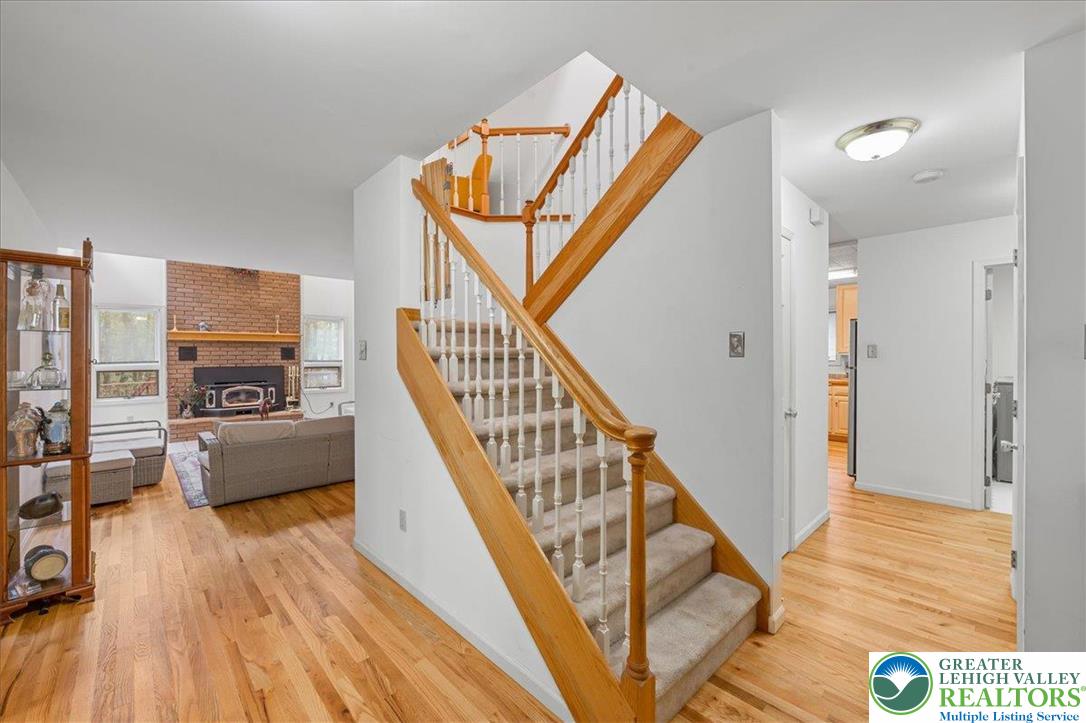 131 Stone Ridge Albrightsville, PA 18210 - Photo 8 of 51 a view of a living room and entryway with wooden floor