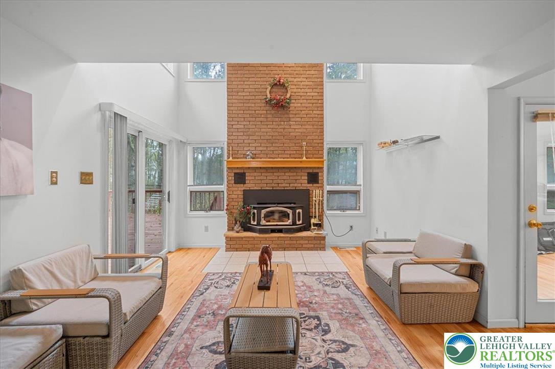 131 Stone Ridge Albrightsville, PA 18210 - Photo 10 of 51 a living room with furniture and a fireplace