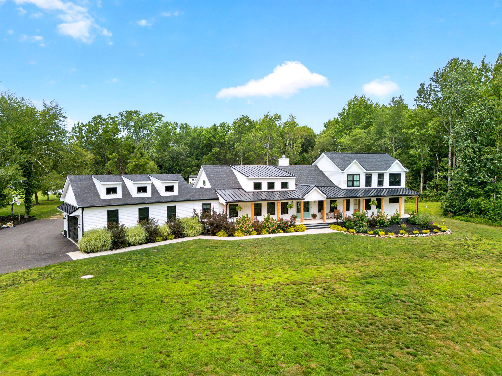 Luxurious estate surrounded by 7.5 AC of serenity.