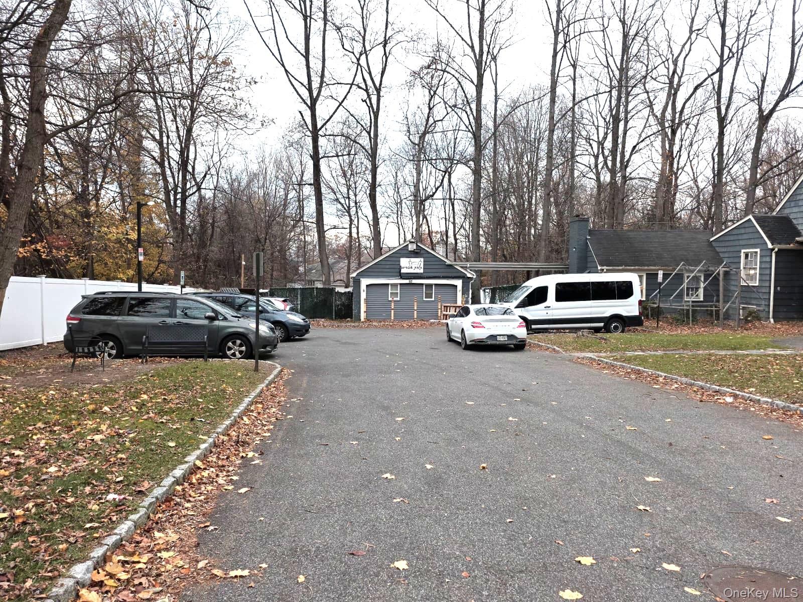 93 College Road Monsey, NY 10952 - Photo 5 of 10 a car parked on the side of the road