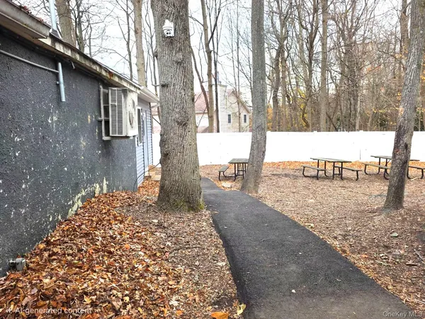 a view of a yard with trees