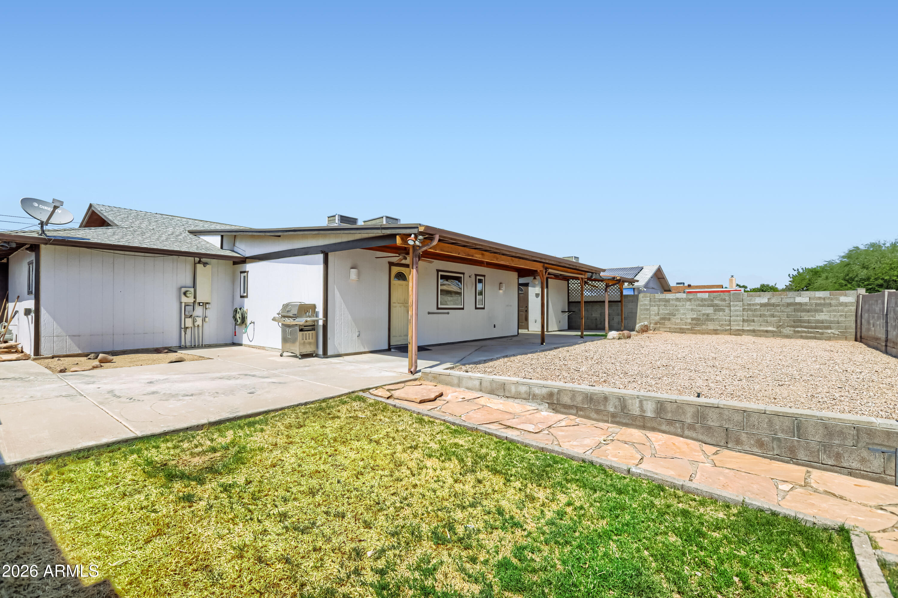 3823 West Greenway Road Phoenix, AZ 85053 - Photo 28 of 28 a front view of a house with a yard