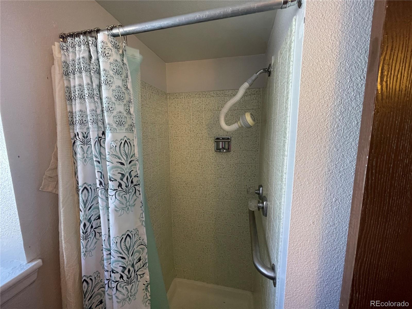 2955 Quincy Place Colorado Springs, CO 80916 - Photo 21 of 33 a bathroom with a shower