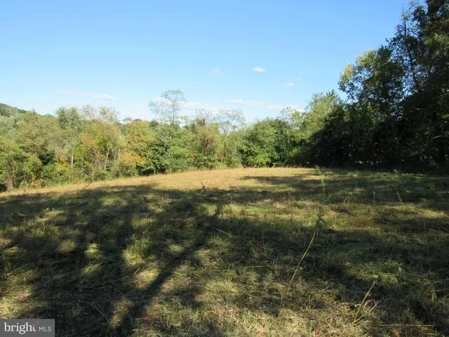 a view of lake view with mountain