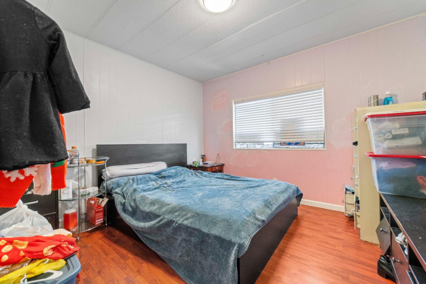 5450 Monterey Road, Unit 157 San Jose, CA 95111 - Photo 15 of 30 a bedroom with a bed and a flat screen tv