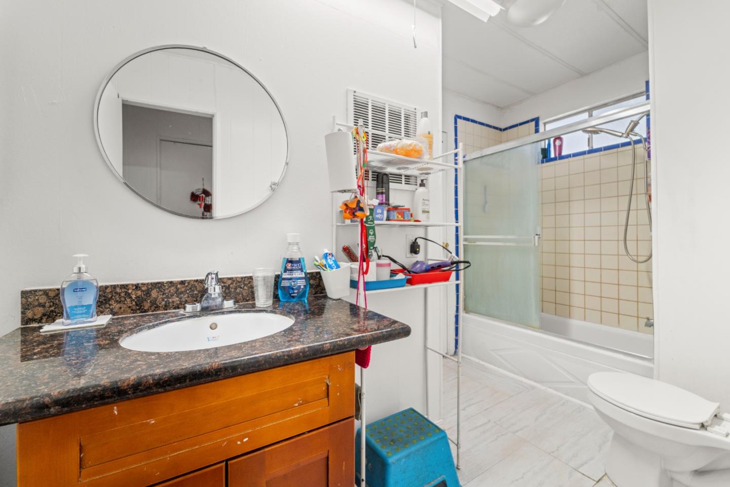 5450 Monterey Road, Unit 157 San Jose, CA 95111 - Photo 16 of 30 a bathroom with a sink a toilet and shower